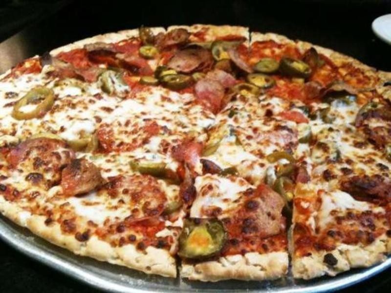 round pie topped with pepperoni and pickled jalapenos, Bearno's Little Sicily