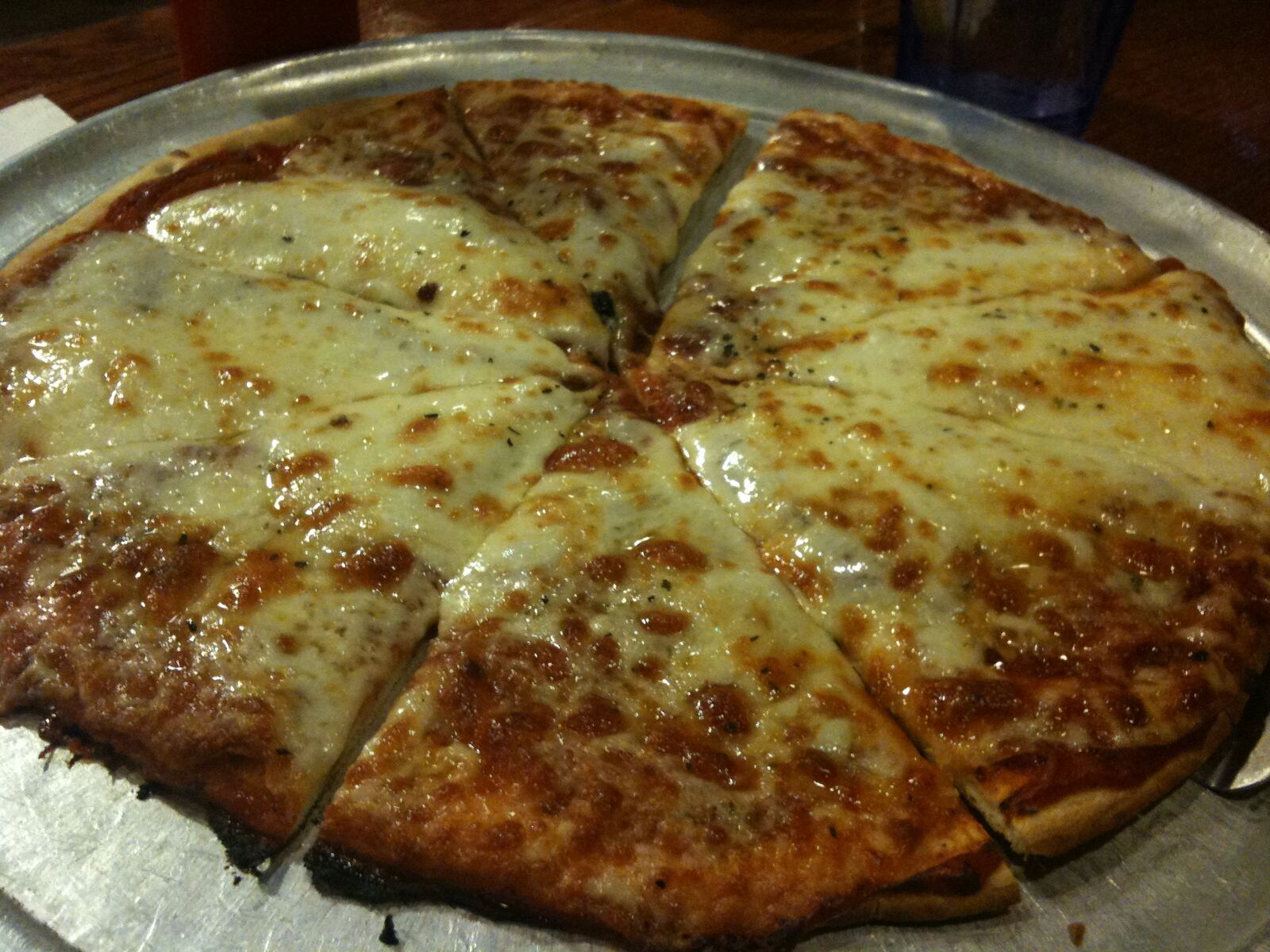 wedge-cut cheese pizza with a thick red sauce, Ralph's Germantowne Pizza Haus