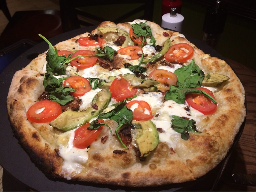 avocado, tomato and greens top a white pie, Red Rose Jems Pizzeria