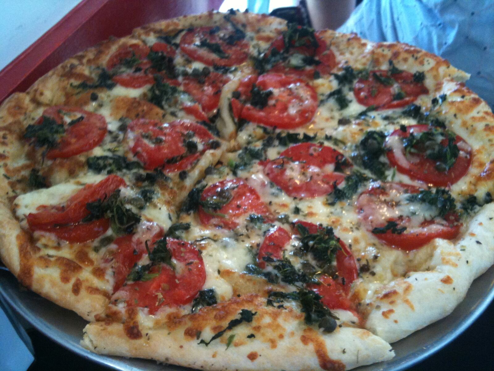 thick soft crust topped with tomato slices and capers, ZZ's Pizza