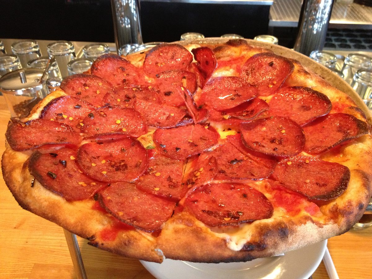 Curled charred pepperoni dusted with chili flakes, Black Sheep Coal Fired Pizza