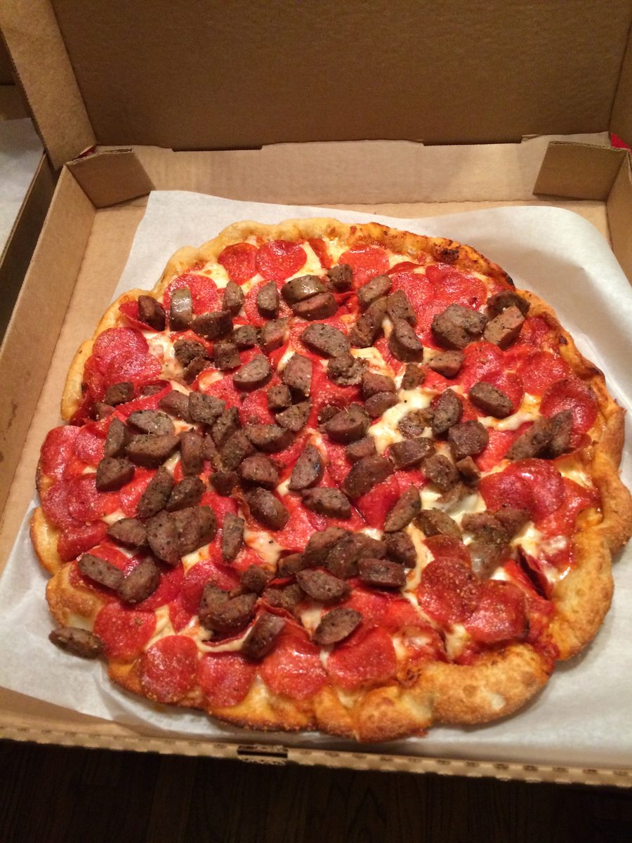 thin-crust tavern-style square slices with heavy red sauce, Edison's Pub