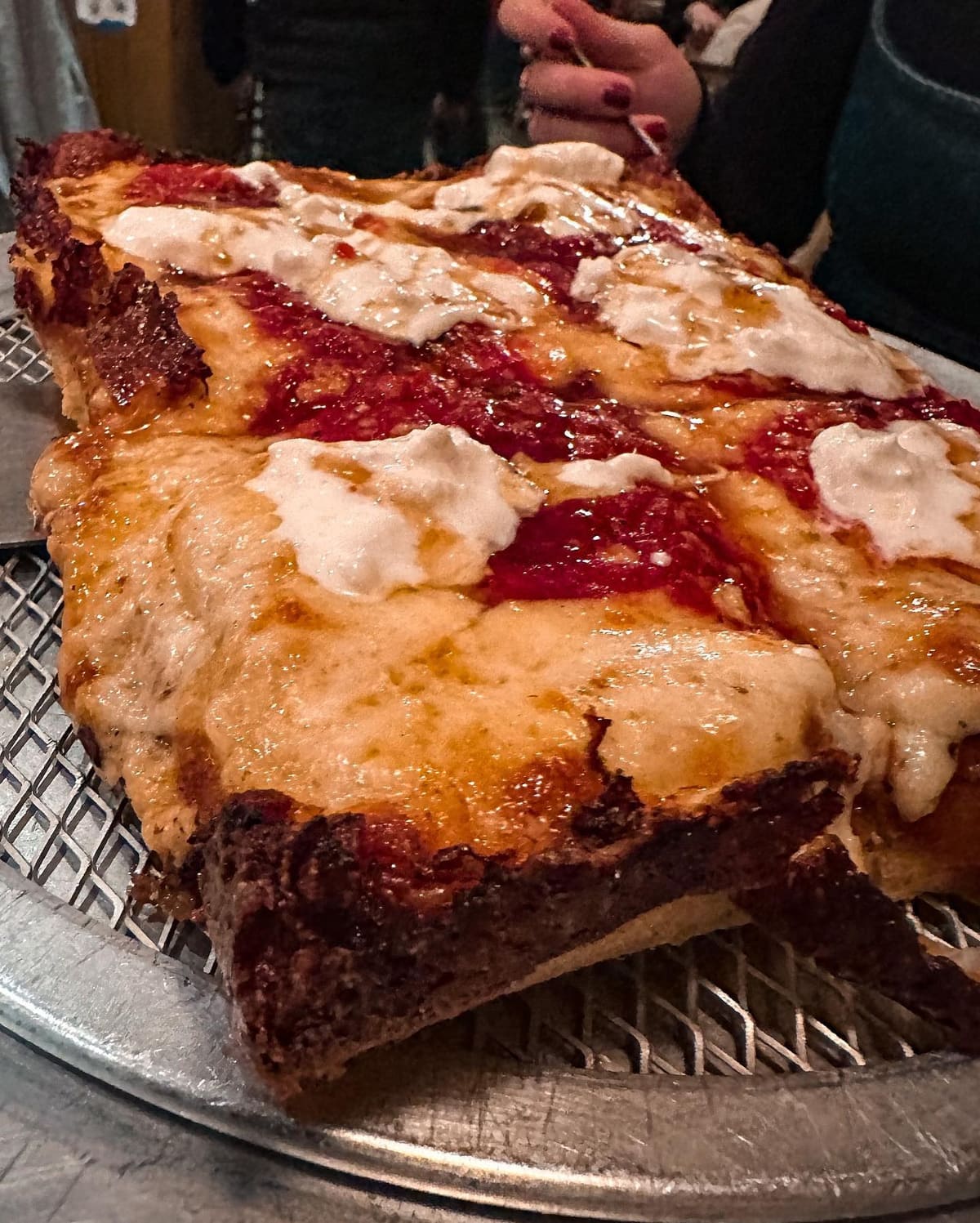 Side profile of the pizza crust at Ace’s Pizza