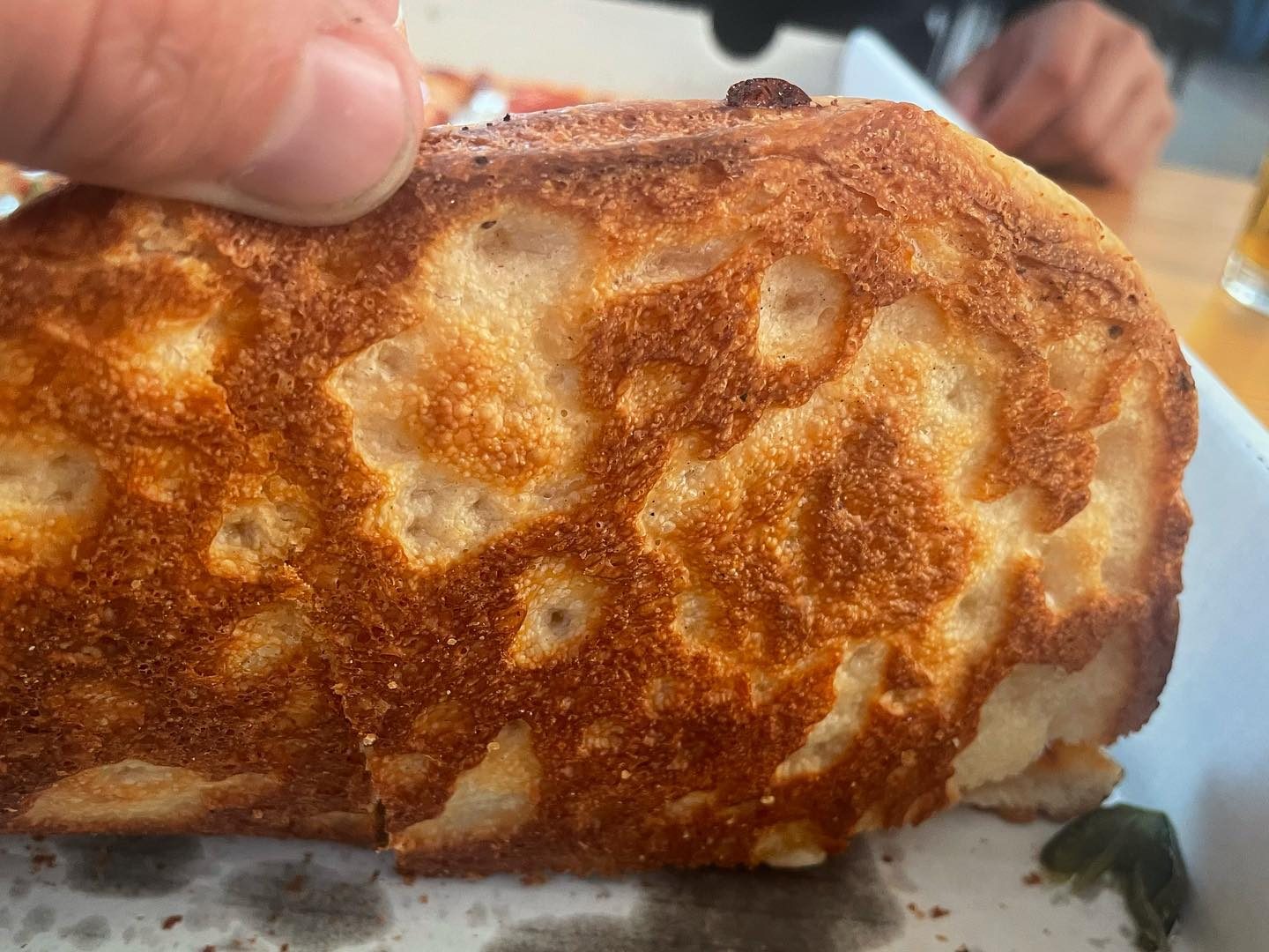 Underside of the pizza crust at Adriatico’s