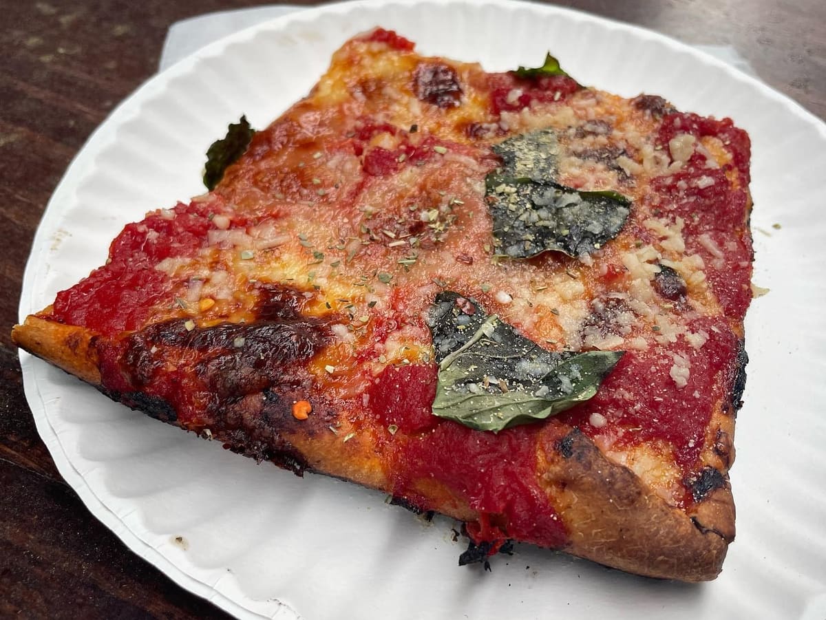 Pizza slice at Artichoke Basille Pizza