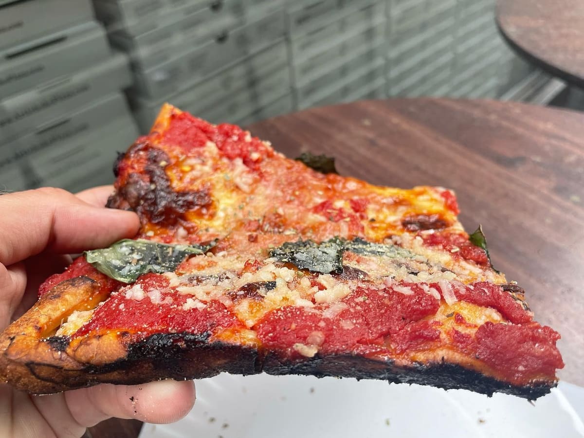 Side profile of the pizza crust at Artichoke Basille Pizza