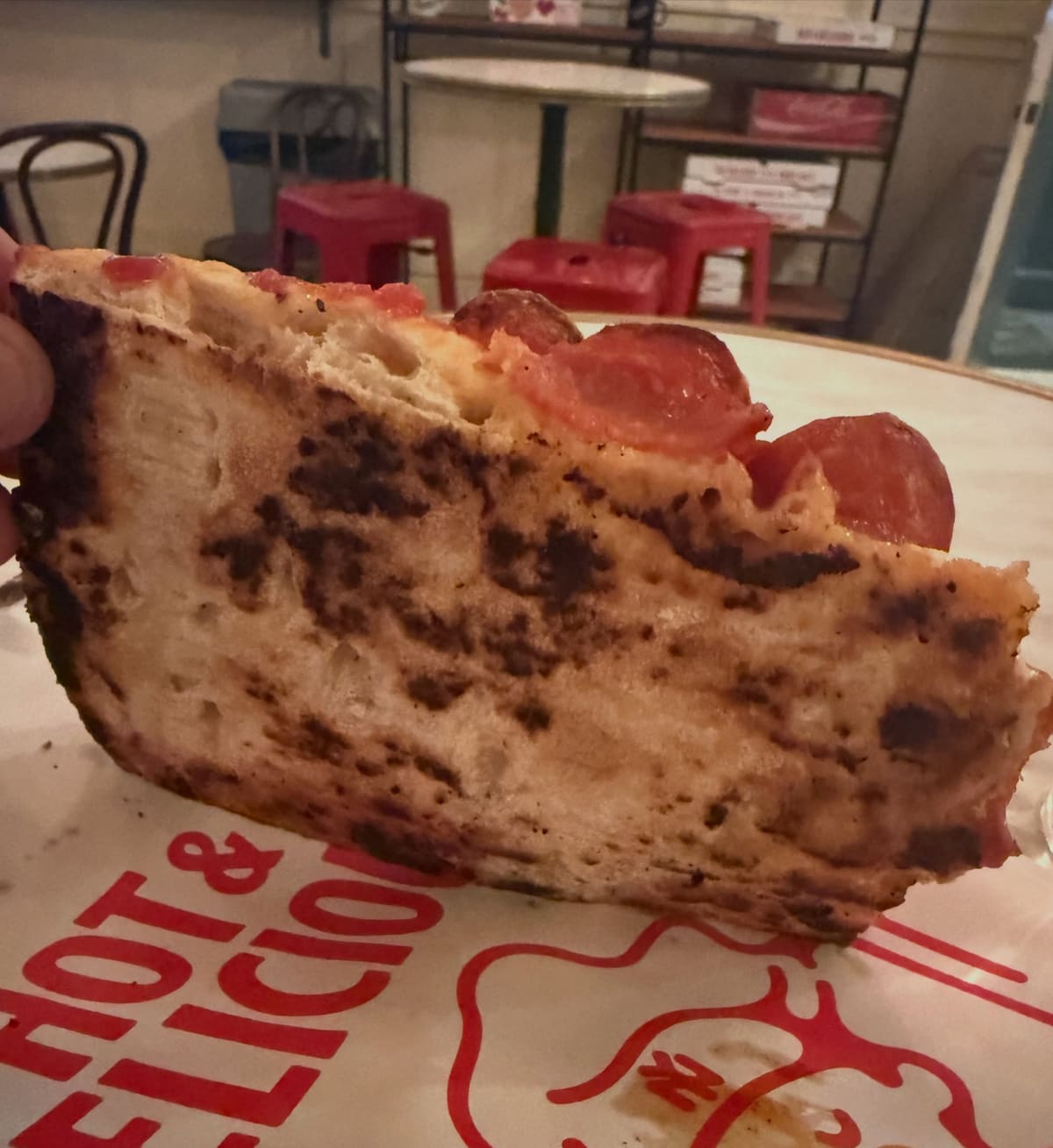 Side profile of the pizza crust at Baby Luc’s in Carroll Gardens