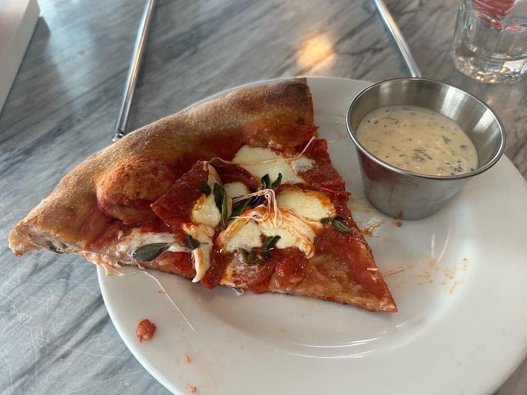 Pizza slice at Baker’s Table Bakery