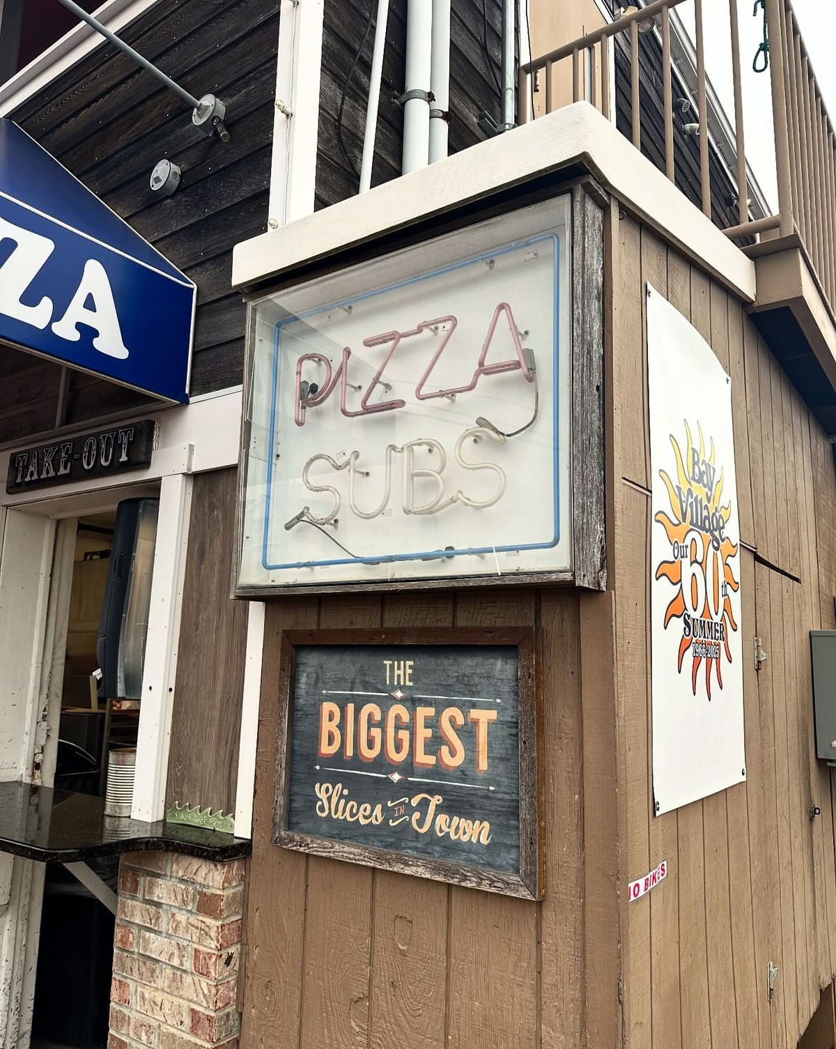 Restaurant exterior sign at Bay Village Pizza in Long Beach Island