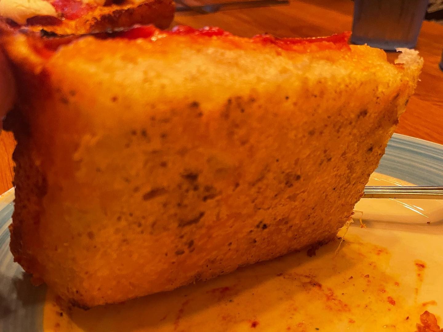 Side profile of the pizza crust at Blue Pan Pizza