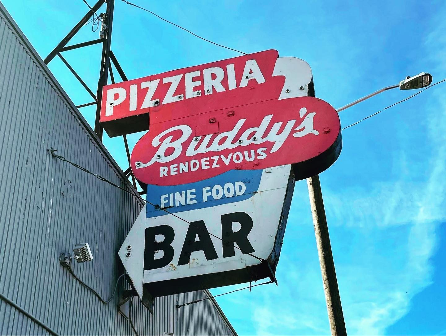 Restaurant sign at Buddy’s Pizza