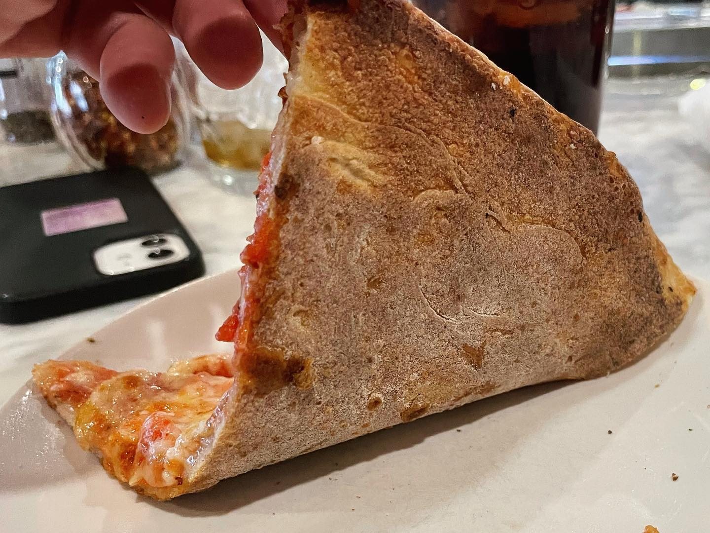 Underside of the pizza crust at Camporosso