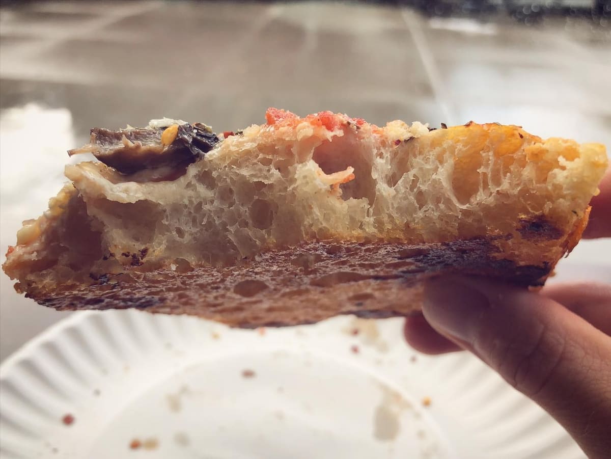 Side profile of the pizza crust at Corner Slice
