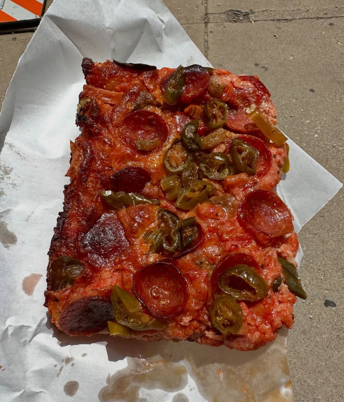 Square pizza slice at D’Amato’s Bakery