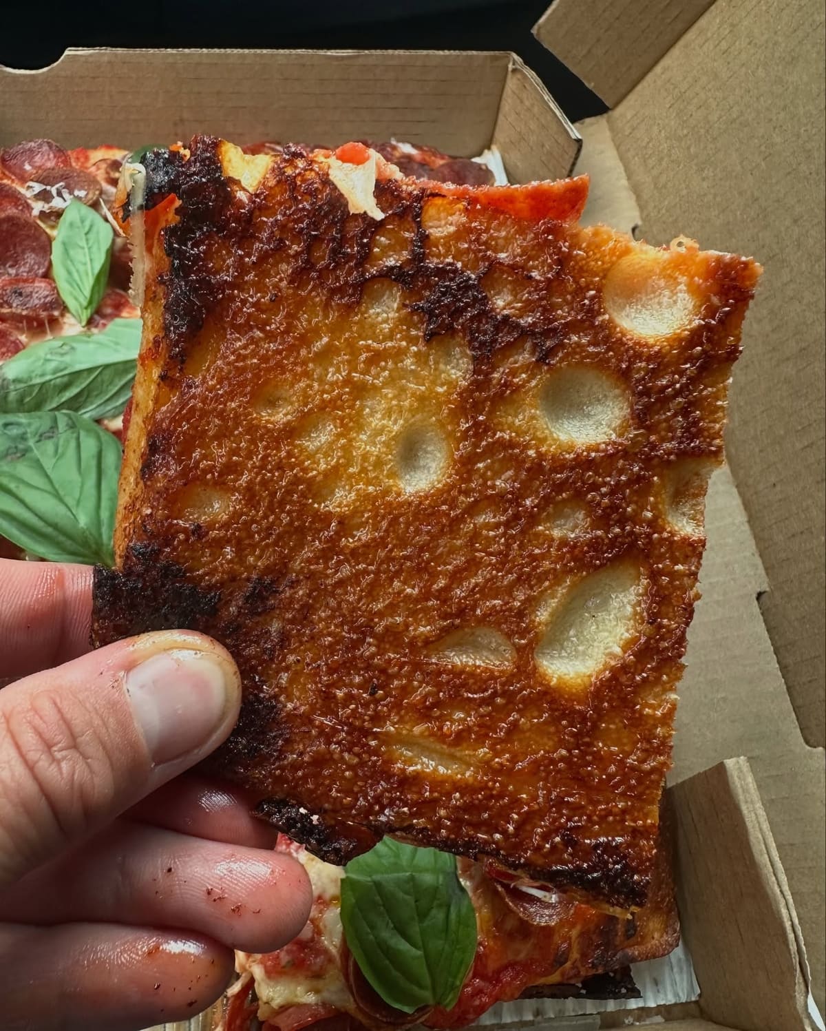 Underside of the pizza crust at Daughter’s Pizza