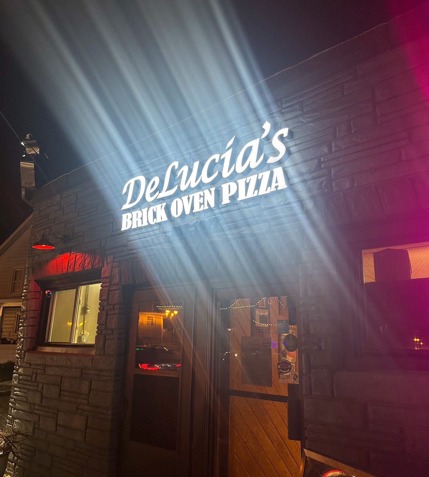 Restaurant exterior at DeLucia’s Brick Oven Pizza