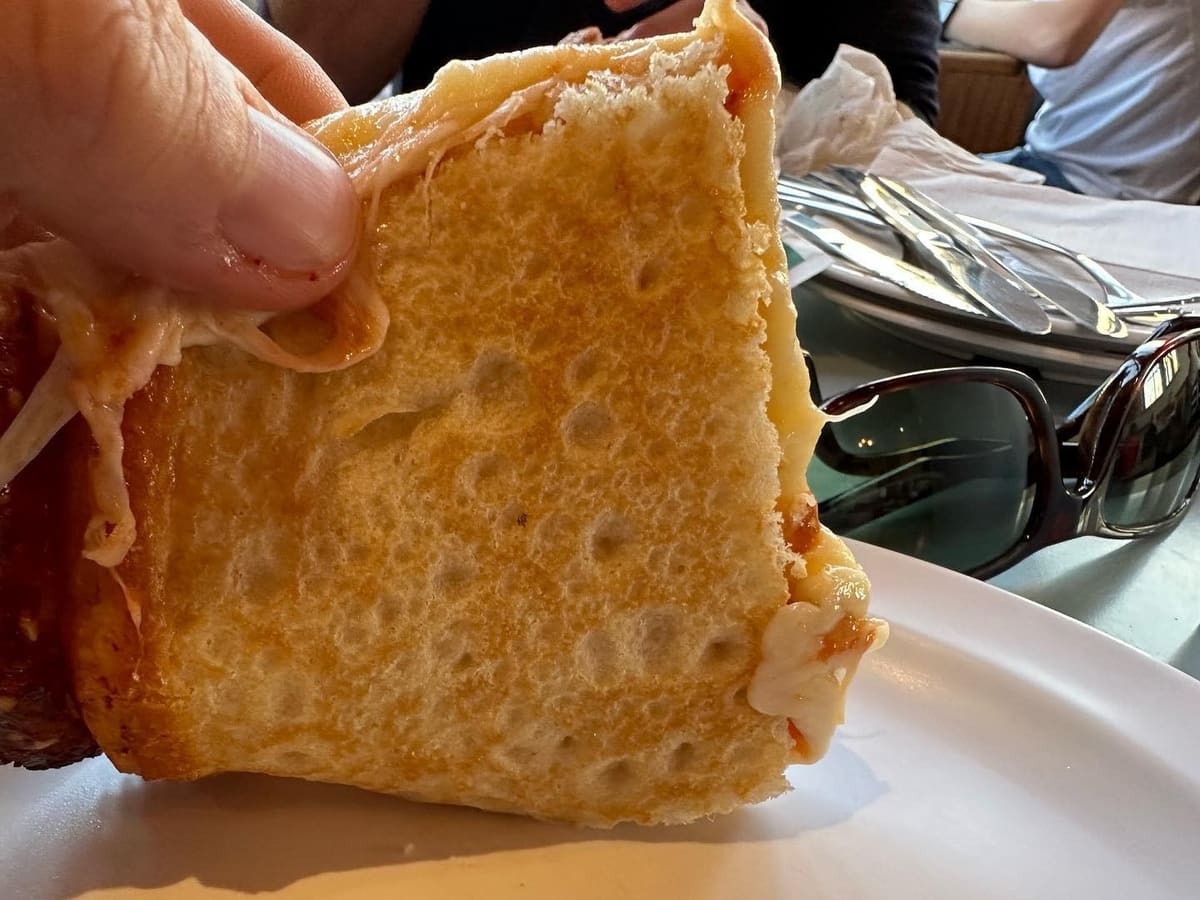 Underside of the pizza crust at Fessler’s Pizza