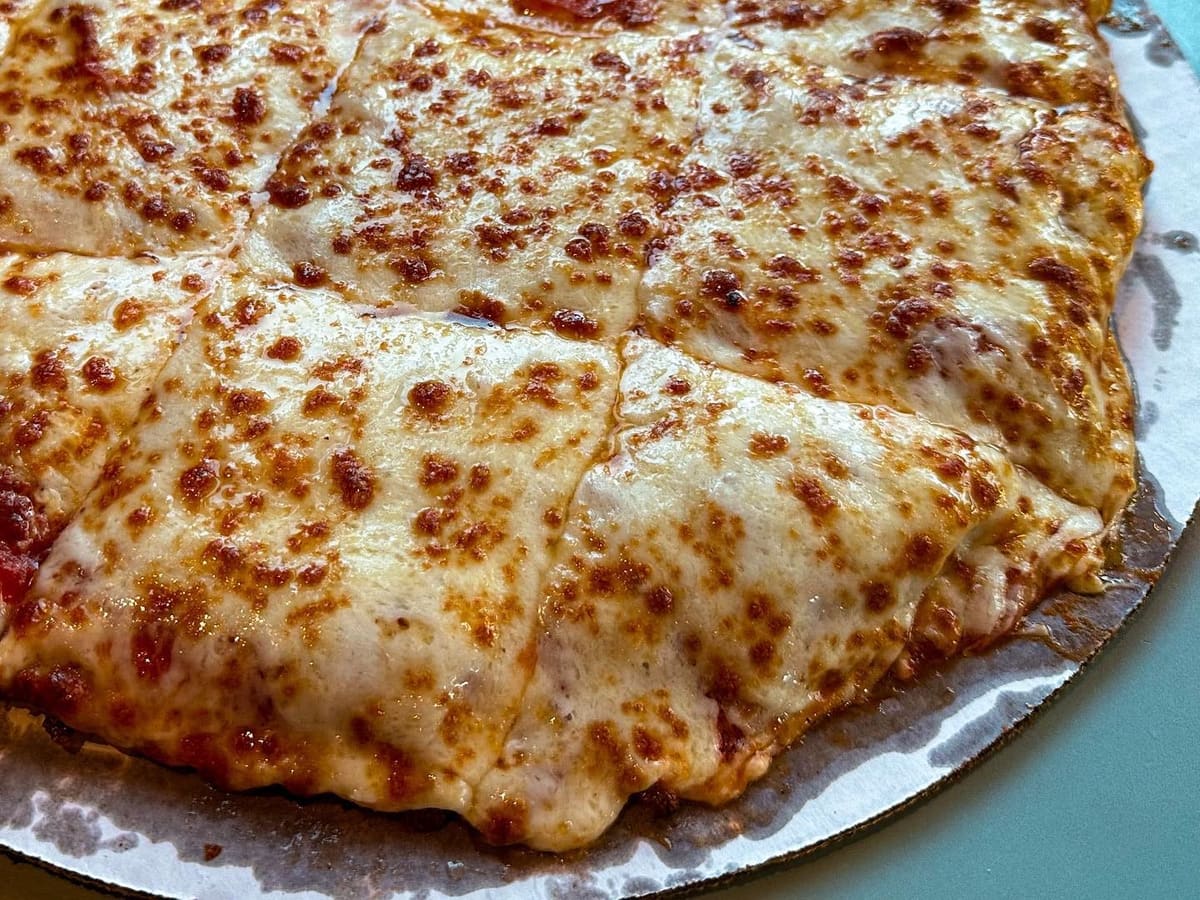 Close view of a pizza slice at Fessler’s Pizza