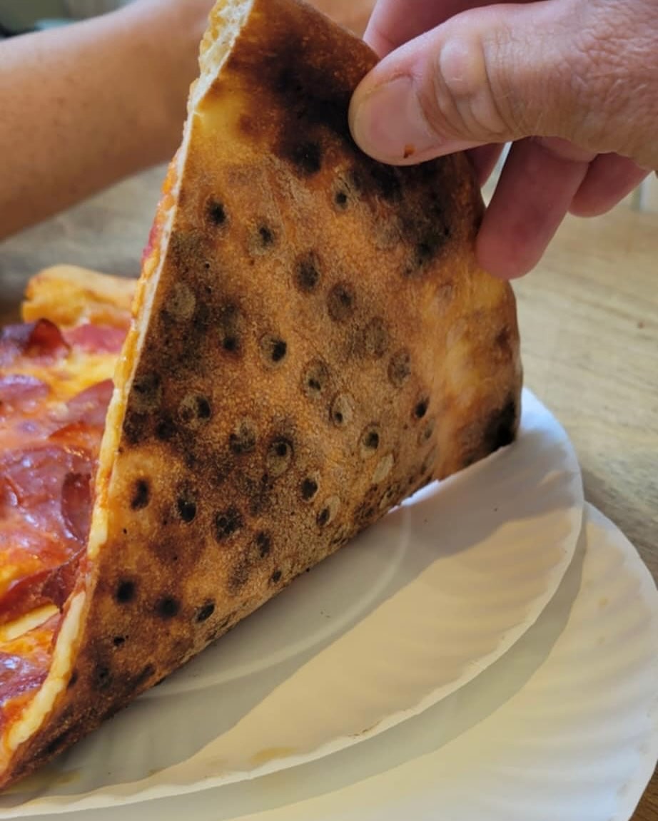 Underside of the pizza crust at Fini Pizza in Williamsburg