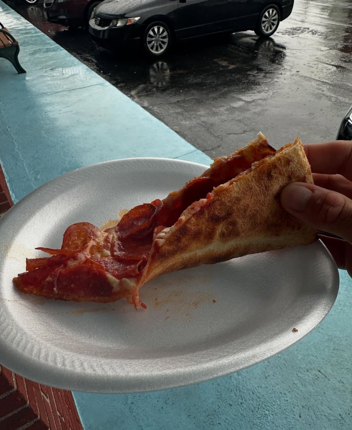 Side profile of a pizza slice at Flour Child Pizza in Long Beach Island