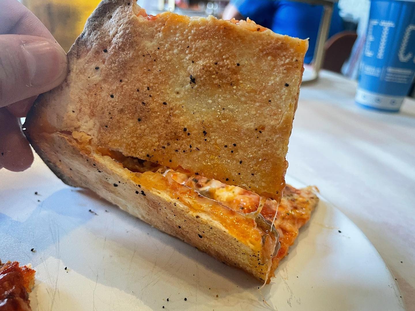 Side profile of the pizza crust at Grabowski’s Pizza