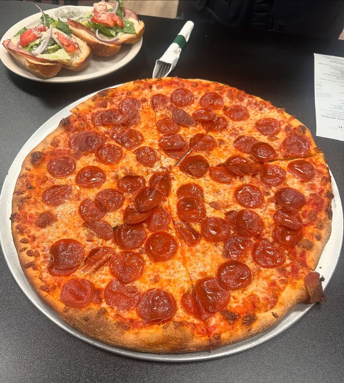 Whole pizza at Il Gusto Pizza & Pasta
