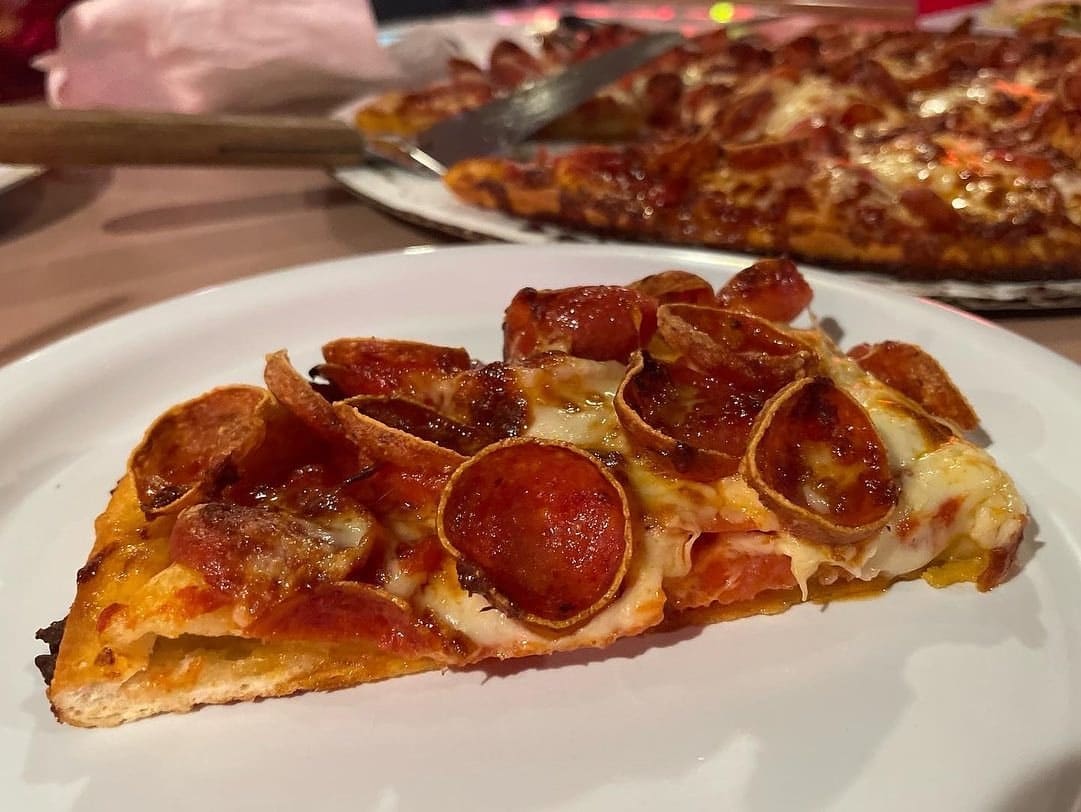 Pizza slice at Jim & Jack’s