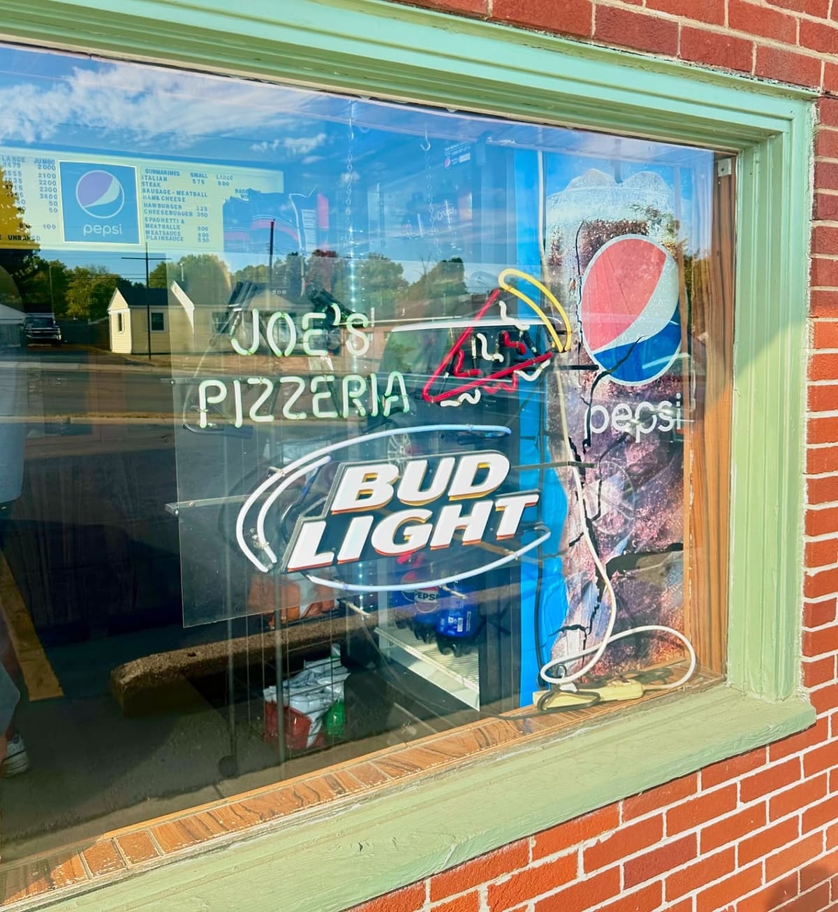 Restaurant sign at Joe’s Pizzeria