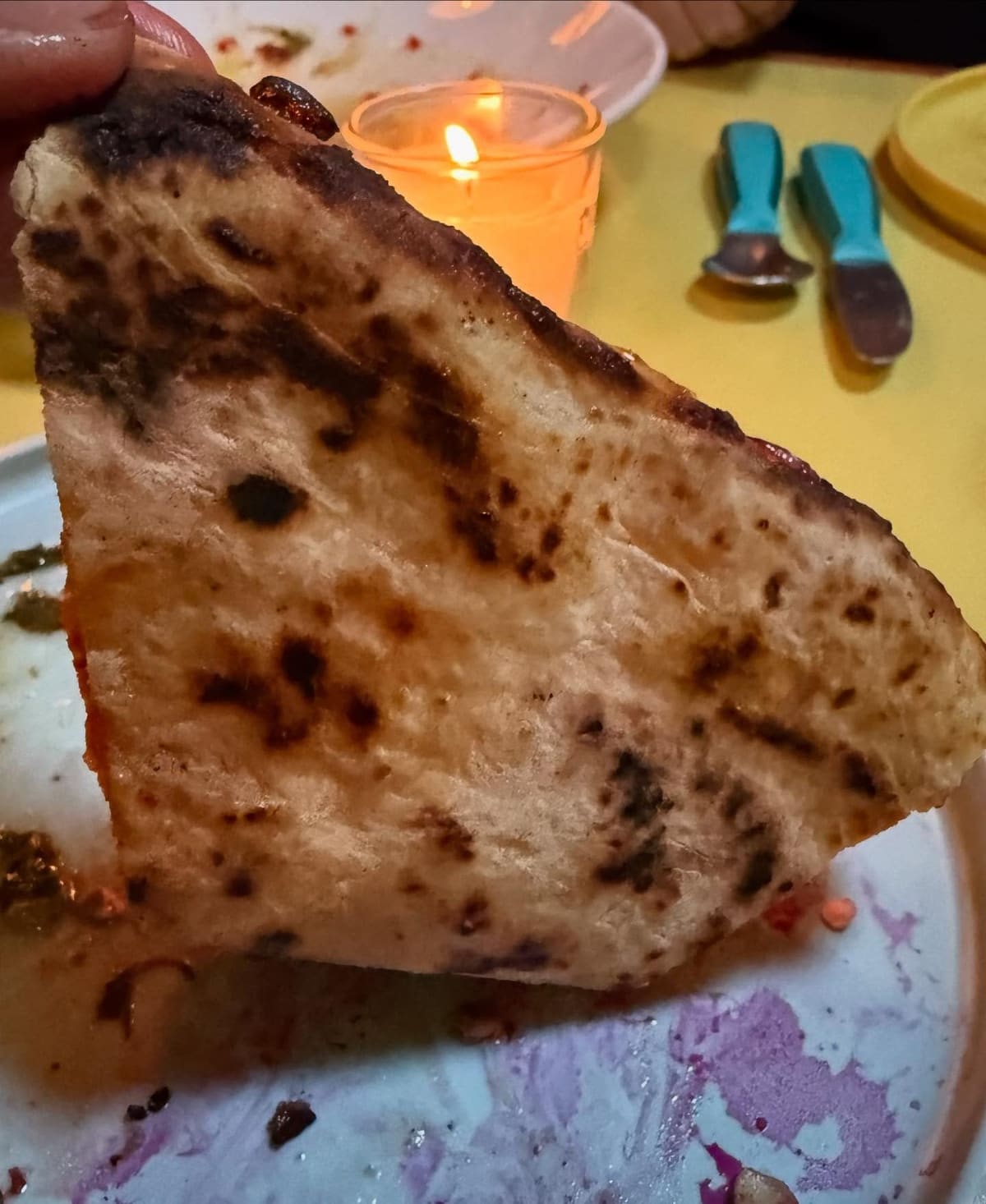 Underside of the pizza crust at June Bug in Somerville