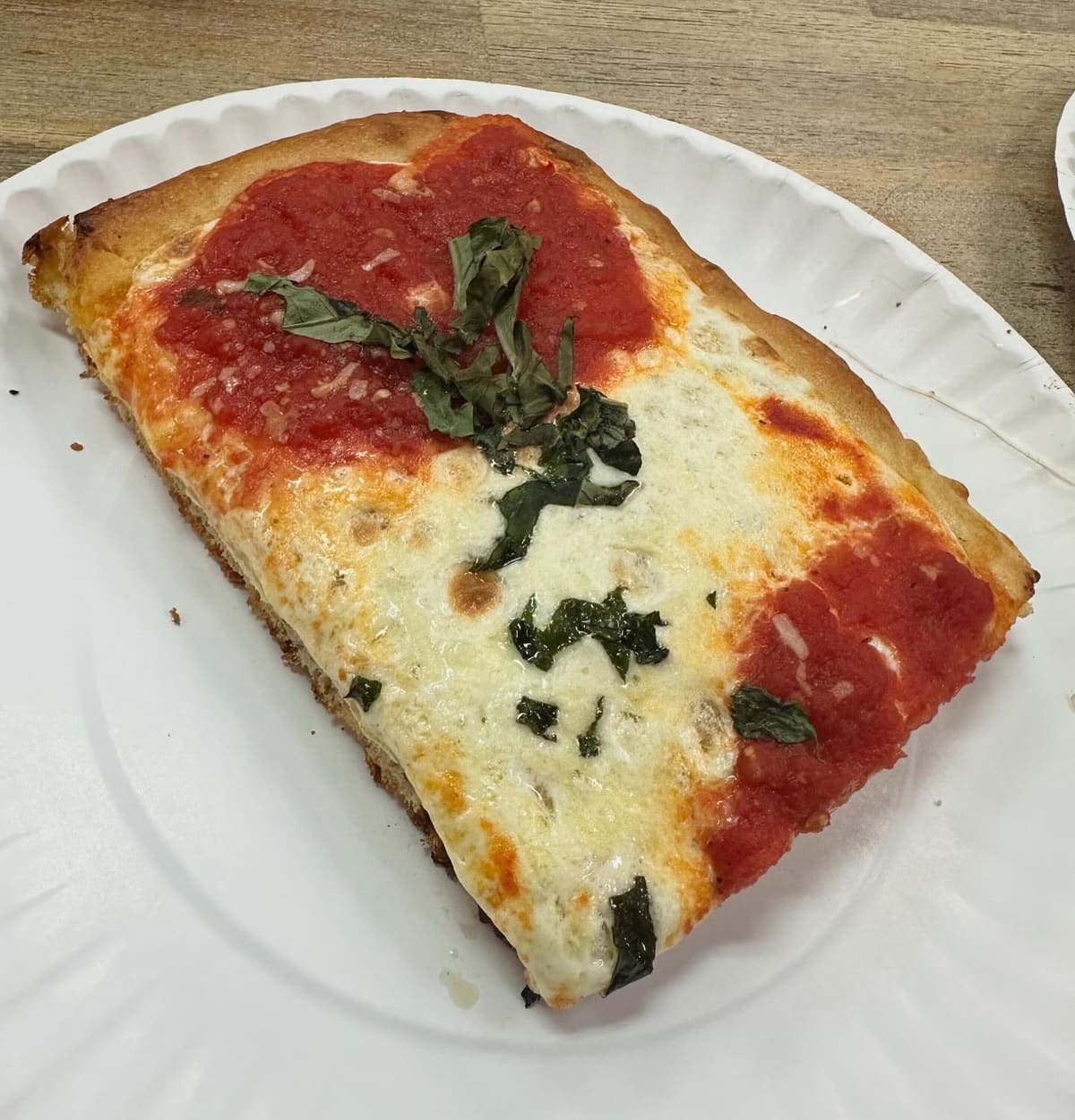 Square pizza slice at Krispy Pizza