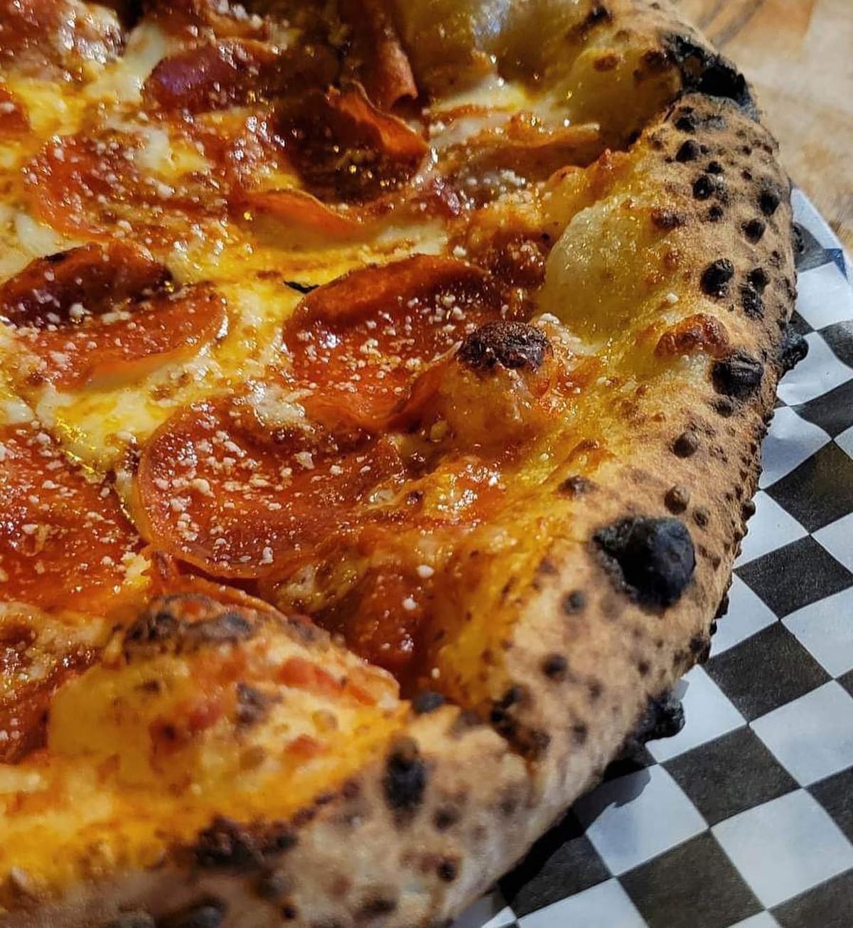 Close view of a pizza slice at Little Hill Pizza