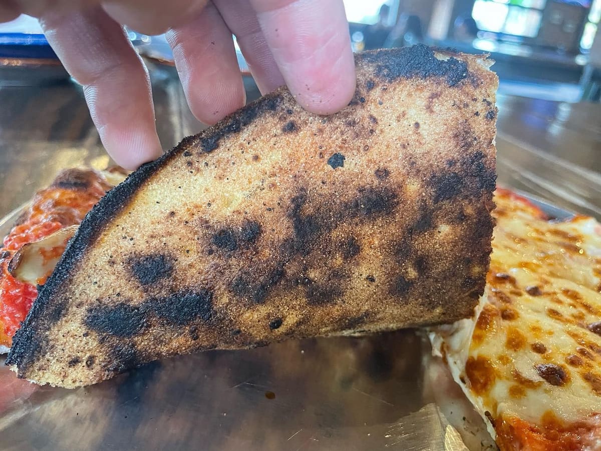 Underside of the pizza crust at Little Miami Brewery