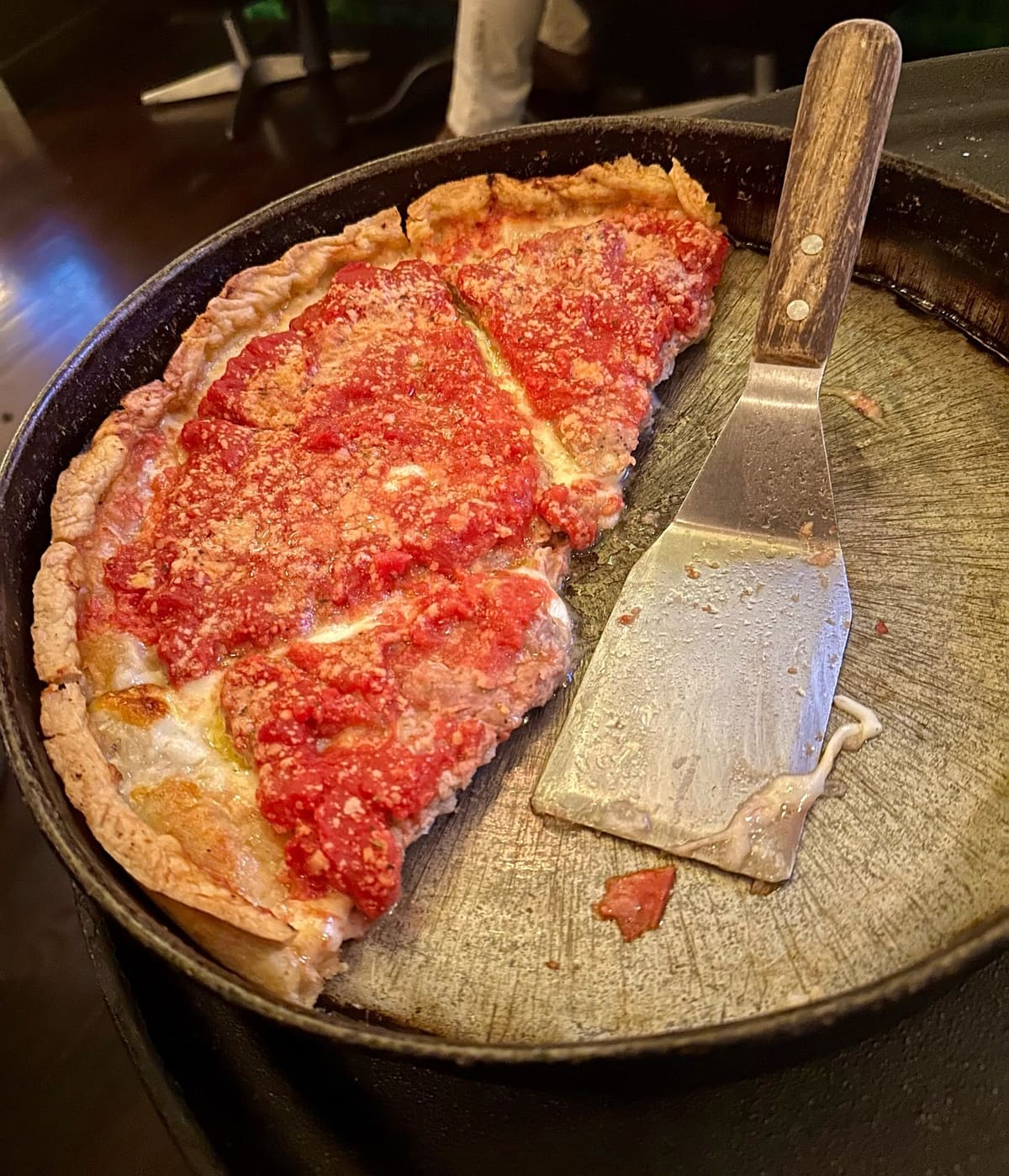 Deep-dish pizza in the pan at Lou Malnati’s in Chicago