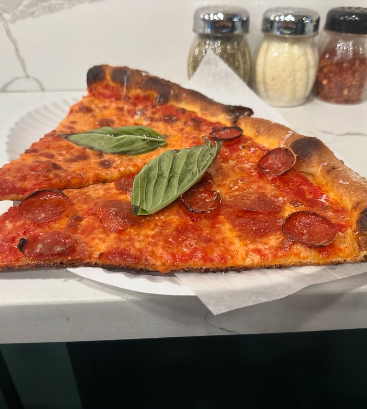 Pizza slice at Lucia Pizza of Avenue X