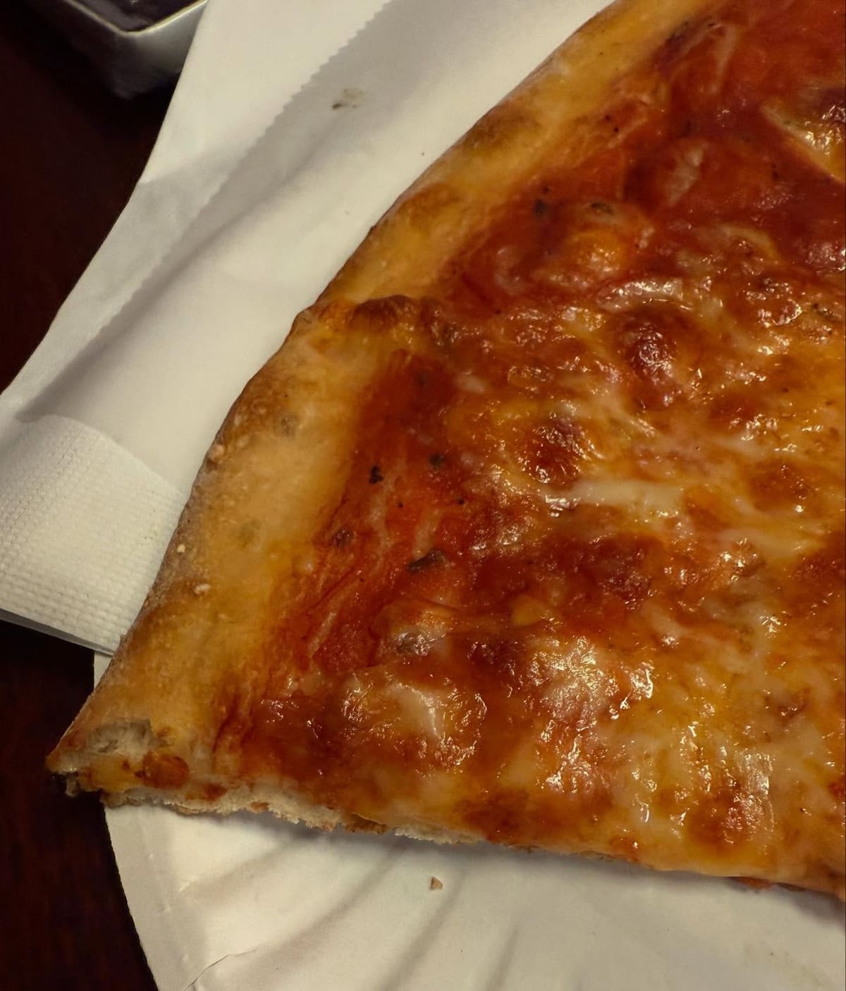 Side profile of the pizza crust at Luigi’s Pizza