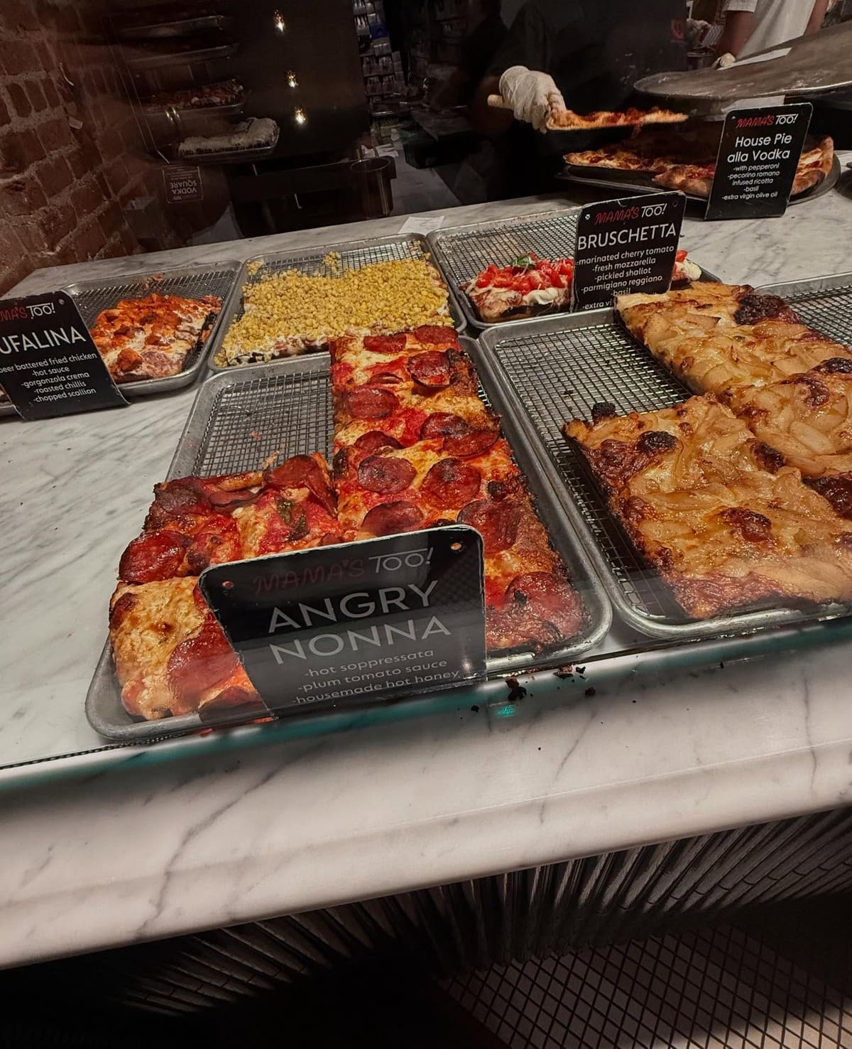 Pizza display at Mama’s Too in West Village