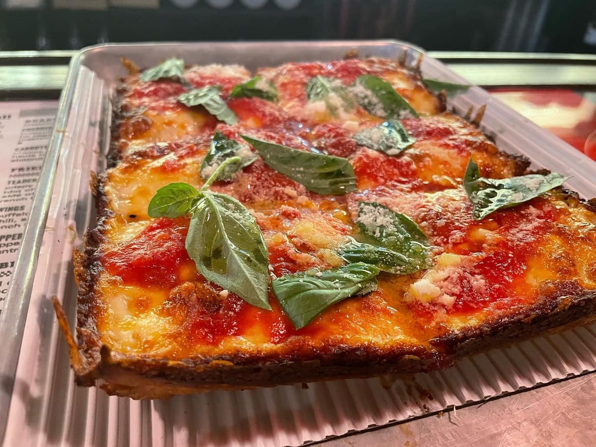 Square pizza slice at Michigan and Trumbull