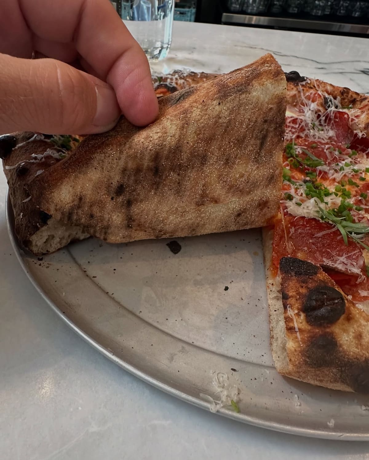 Underside of the pizza crust at Middle Brow