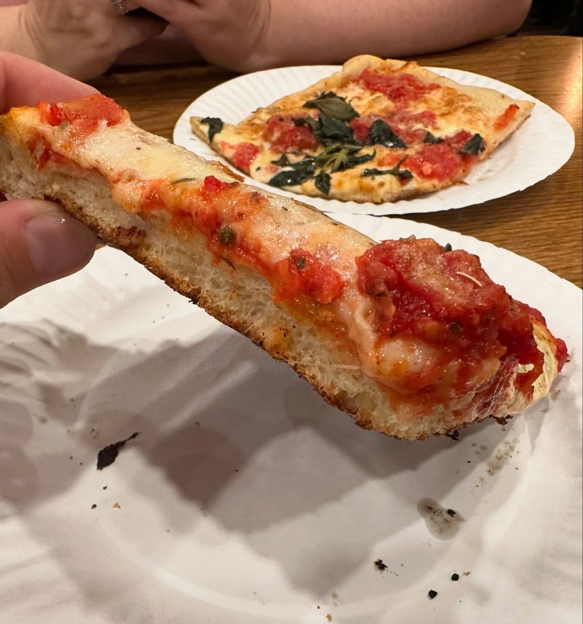 Side profile of the pizza crust at NY Pizza Suprema