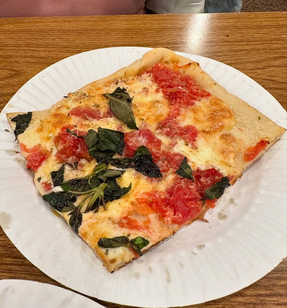Pizza slice at NY Pizza Suprema