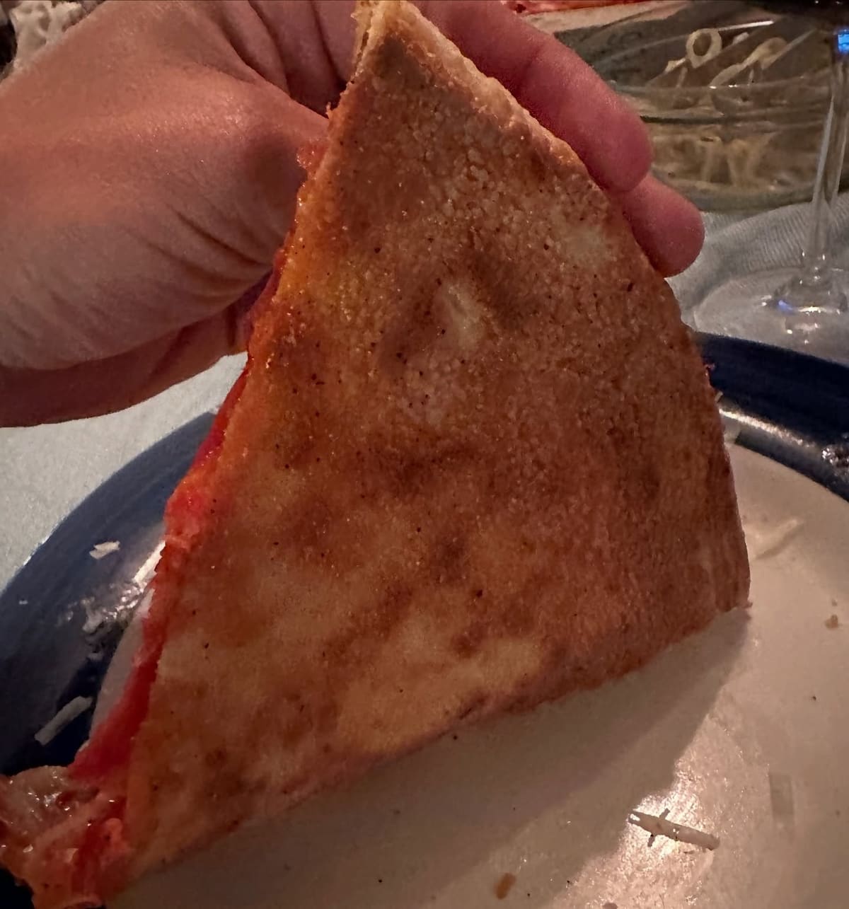 Underside of the pizza crust at Pastizza Pizza & Pasta