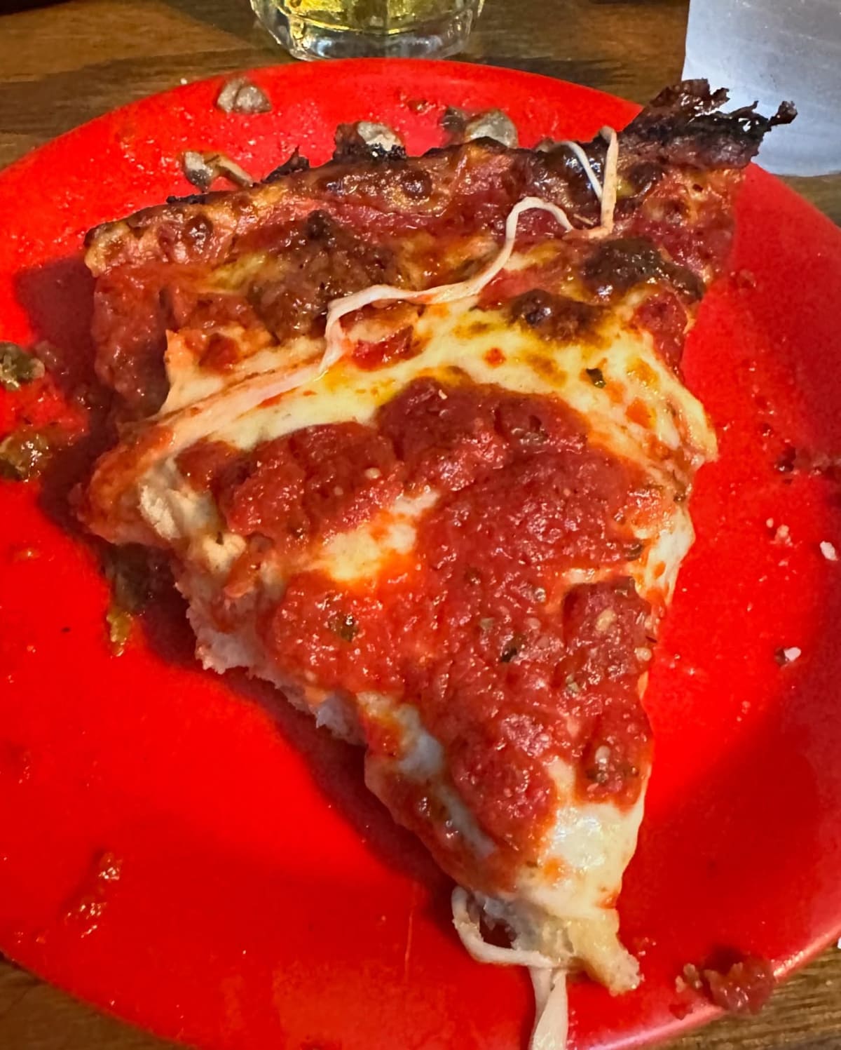 Pizza slice at Pequod’s Pizza