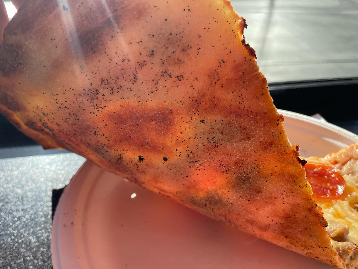 Underside of the pizza crust at Pin Up Pizza