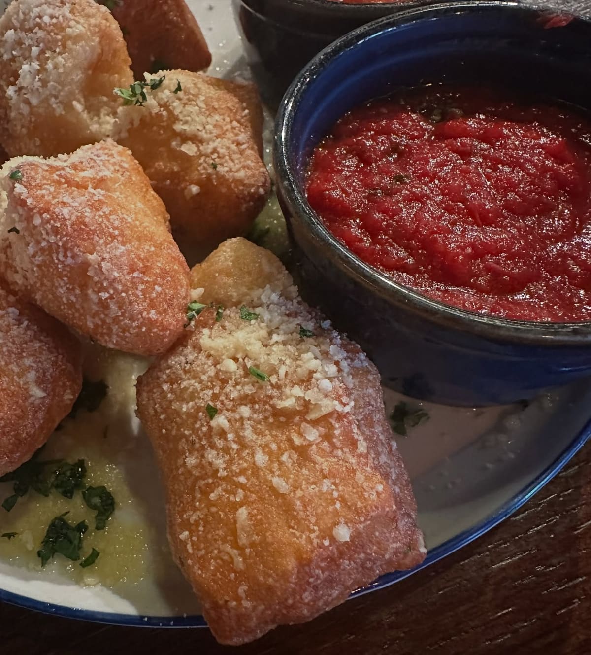 Pizza and dishes on the table at Professor Pizza