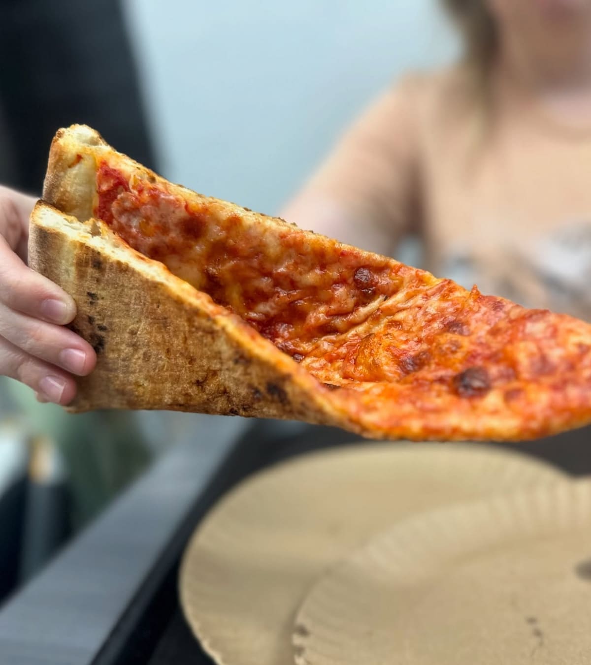 Side profile of the pizza crust at Quality Pizza Co