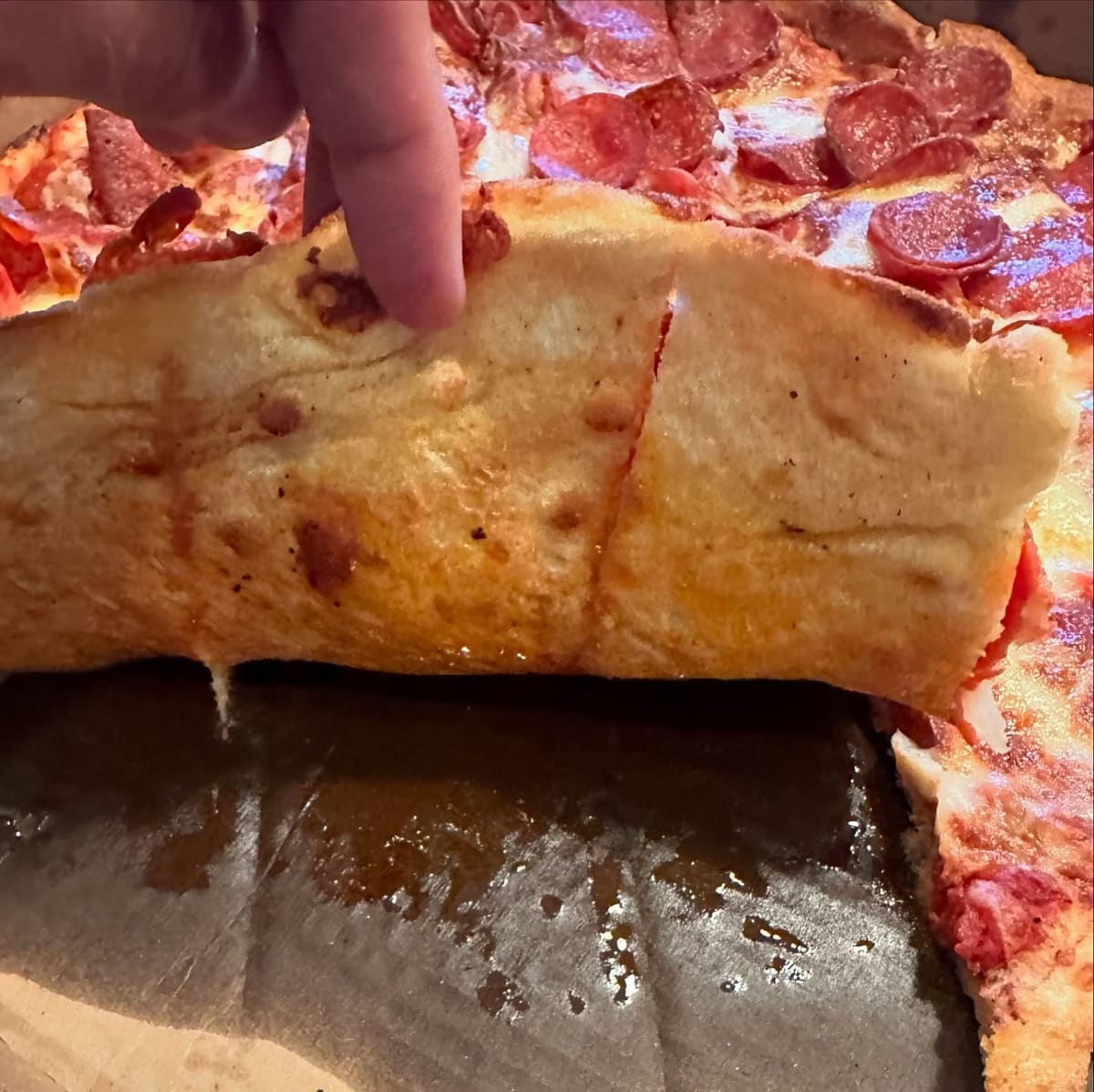 Side profile of the pizza crust at Queen City Pizza