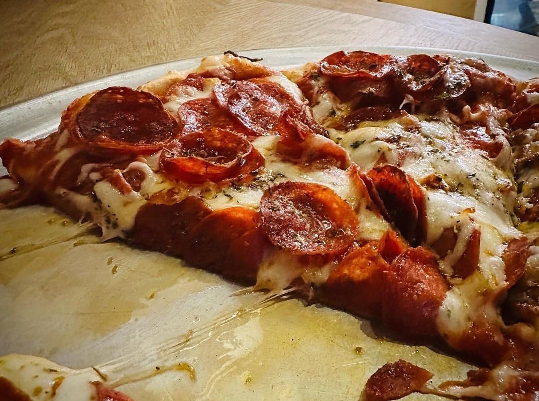 Pizza slice at Ramundo’s Pizzeria