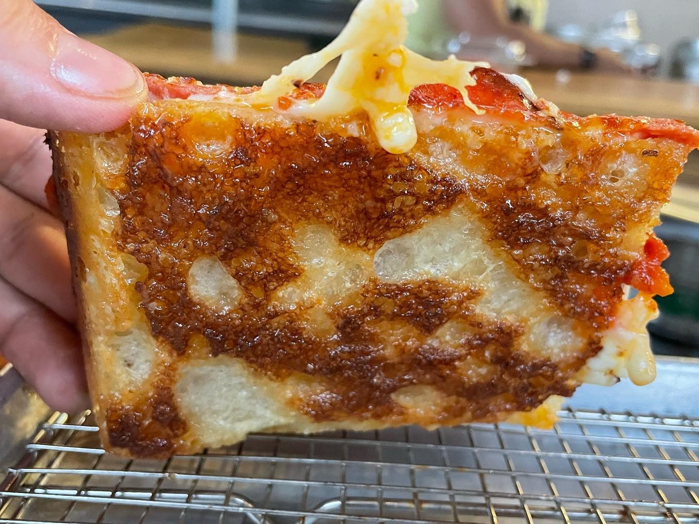 Underside of the pizza crust at Red Light
