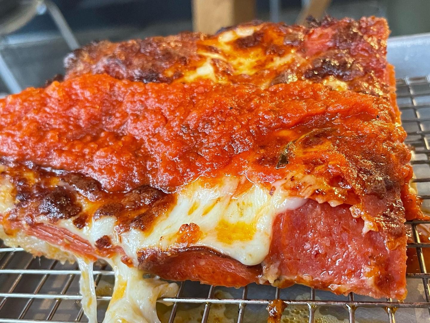 Close view of a pizza slice at Red Light