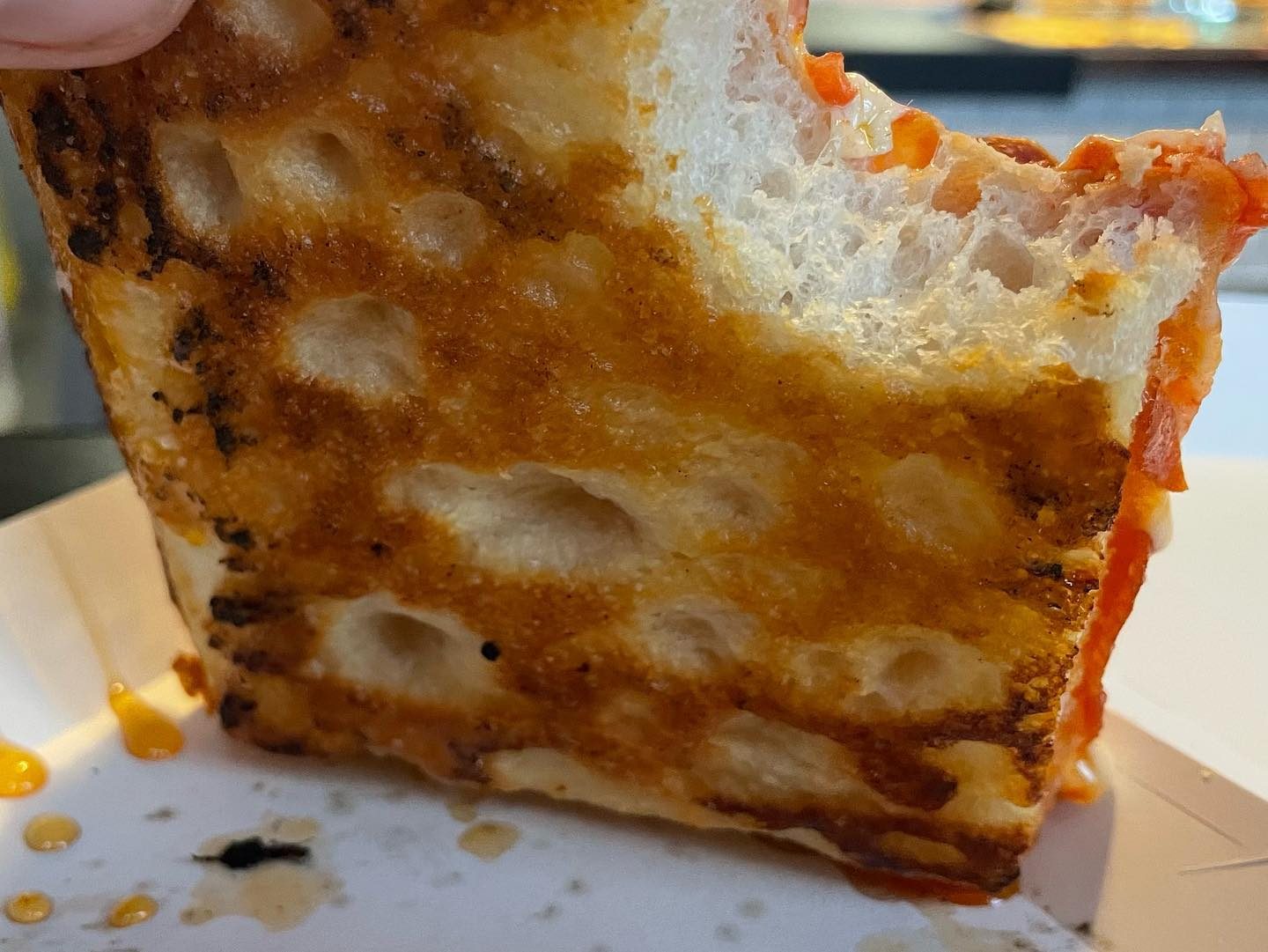 Side profile of the pizza crust at Slices & Pie